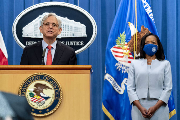 ASSOCIATED PRESS
                                Attorney General Merrick Garland, accompanied by Assistant Attorney General for Civil Rights Kristen Clarke, right, spoke at a news conference at the Department of Justice in Washington, today, to announce that the Department of Justice is opening an investigation into the city of Phoenix and the Phoenix Police Department.
