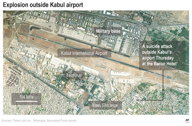 ASSOCIATED PRESS
                                Satellite image shows Kabul International Airport and the location of an explosion near the Abbey Gate.