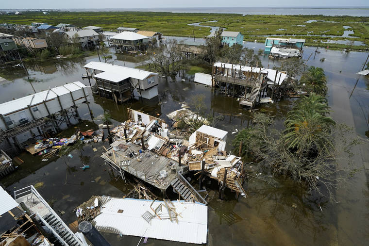 ASSOCIATED PRESS
                                The remains of destroyed homes and businesses are seen in the aftermath of Hurricane Ida in Grand Isle, La.