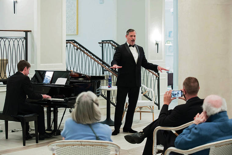 NEW YORK TIMES
                                Above, Peter Kendall Clark, an opera singer, performs a private concert at the Watermark at Brooklyn Heights.