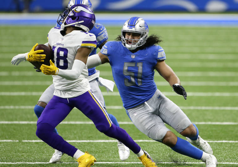 ASSOCIATED PRESS
                                Jahlani Tavai, right, was waived by the Lions today as NFL teams reduced their roster to 53 players.