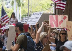 CINDY ELLEN RUSSELL / CRUSSELL@STARADVERTISER.COM
                                People protested city and state COVID-19 vaccine mandates at the Capitol on Monday.
