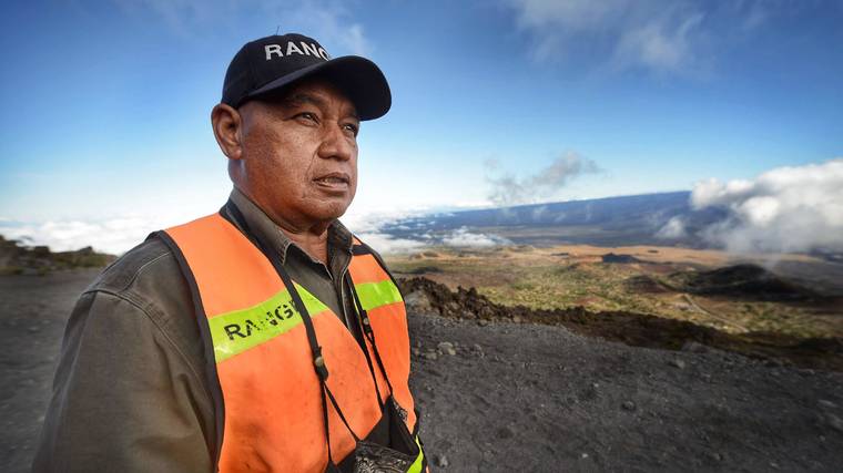 COURTESY UNIVERSITY OF HAWAII
                                Maunakea Ranger DuWayne Waipa educates visitors about the risks of driving to the summit of Mauna Kea.