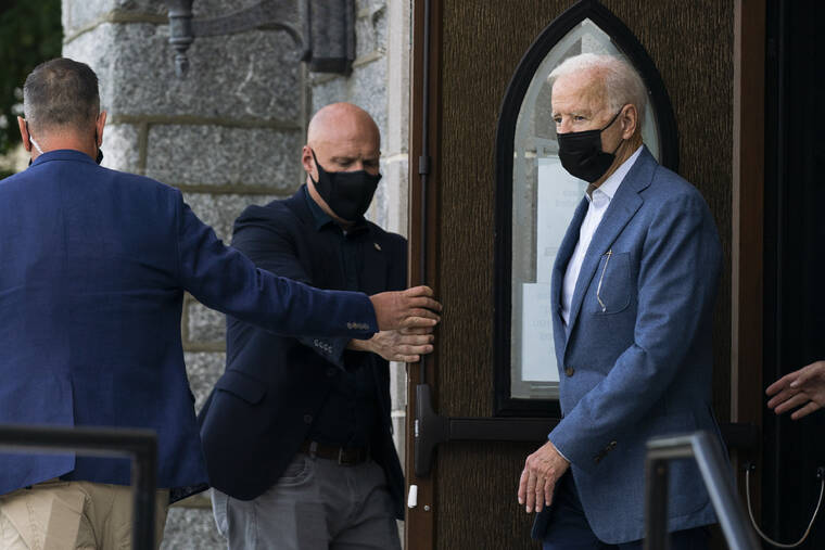 ASSOCIATED PRESS
                                President Joe Biden leaves St. Edmund Roman Catholic Church in Rehoboth Beach, Del., after attending a Mass, Saturday.