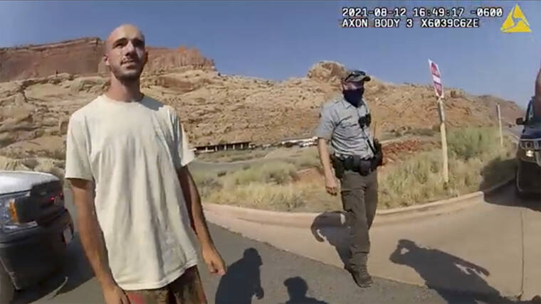 MOAB POLICE DEPARTMENT VIA AP
                                This police camera video provided by The Moab Police Department shows Brian Laundrie talking to a police officer after police pulled over the van he was traveling in with his girlfriend, Gabrielle “Gabby” Petito, near the entrance to Arches National Park on Aug. 12. The couple was pulled over while they were having an emotional fight. Petito was reported missing by her family a month later and authorities said a body found in Wyoming Sunday is believed to be her.