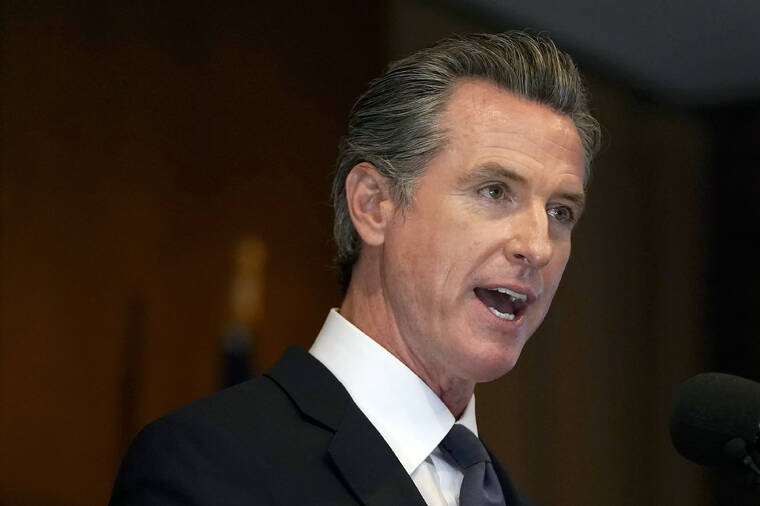 ASSOCIATED PRESS / SEPT. 14
                                Gov. Gavin Newsom speaks in San Francisco. California will be the first state to bar mega-retailers from firing warehouse workers for missing quotas that interfere with bathroom and rest breaks. The legislation signed Wednesday, Sept. 22, by Newsom grew from Amazon’s drive to speed goods to consumers.