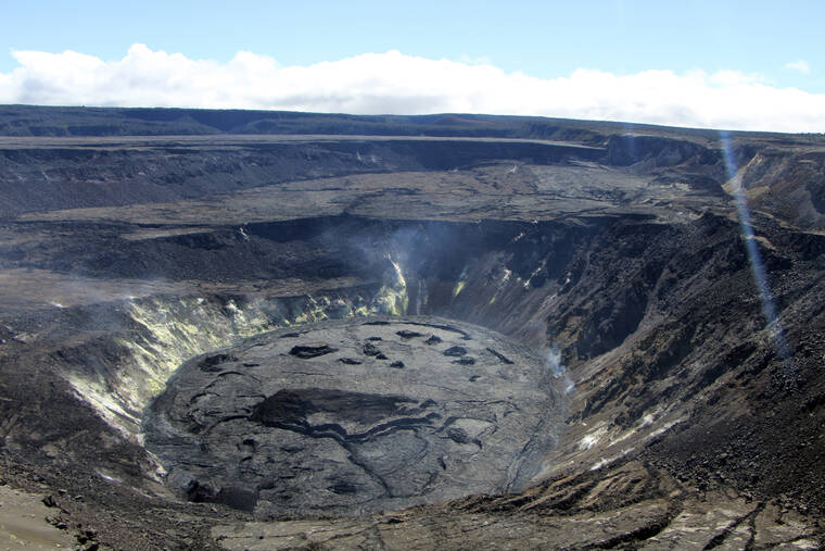 USGS VIA AP
                                A photograph provided by the U.S. Geological Survey shows the crater of Kilauea volcano in Hawaii National Park in August.