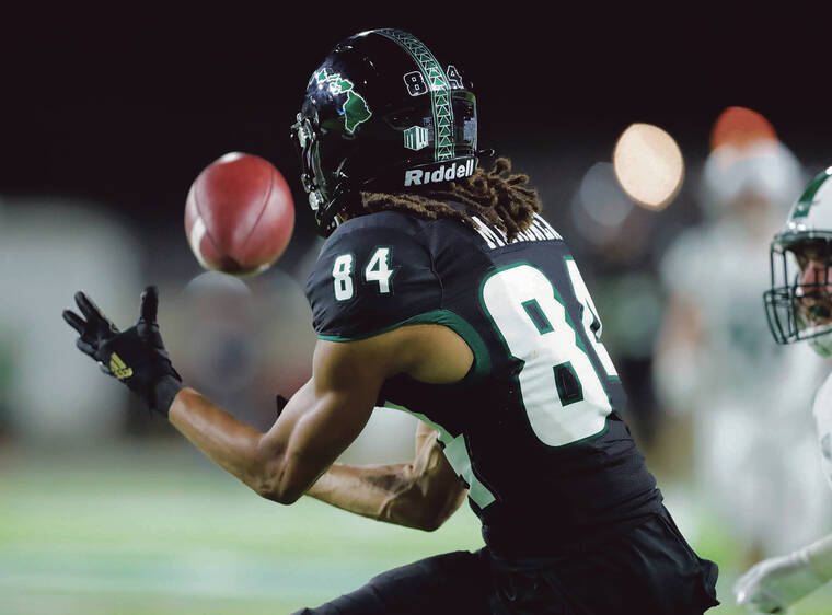 JAMM AQUINO / JAQUINO@STARADVERTISER.COM
                                Hawaii wide receiver Nick Mardner hauls in a pass against the Portland State Vikings during the second half.
