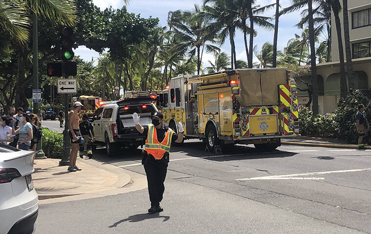 CRAIG T. KOJIMA / CKOJIMA@STARADVERTISER.COM
                                Honolulu police and firefighters were on the scene of a structure fire this morning in Waikiki at the location of surfboard racks near the Moana Surfrider hotel and HPD’s Waikiki substation.