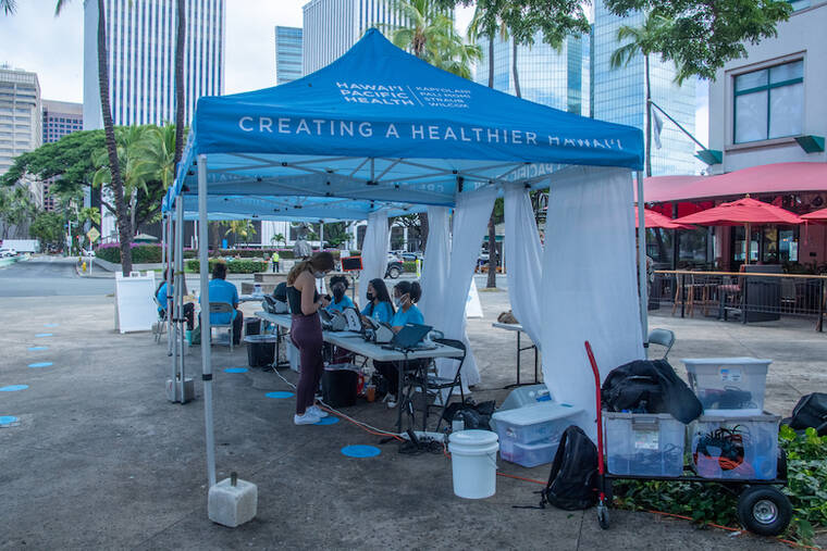 CRAIG T. KOJIMA / OCT. 21
                                Hawaii Pacific Health set up a mobile COVID-19 vaccination clinic at Hawaii Pacific University campus at Aloha Tower Marketplace.