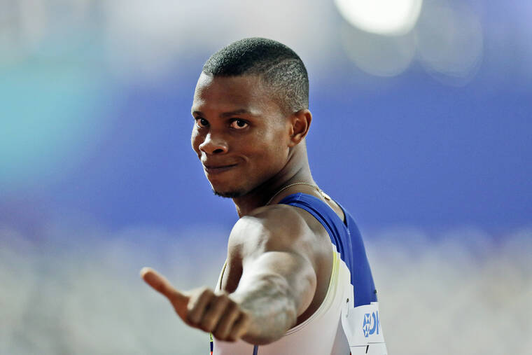 ASSOCIATED PRESS / 2019
                                Alex Quiñónez, of Ecuador, gestures after a men’s 200 meter heat at the World Athletics Championships in Doha, Qatar. Olympic sprinter Alex Quiñónez was fatally shot in the port city of Guayaquil in Ecuador on Friday night, Oct. 22, police said.