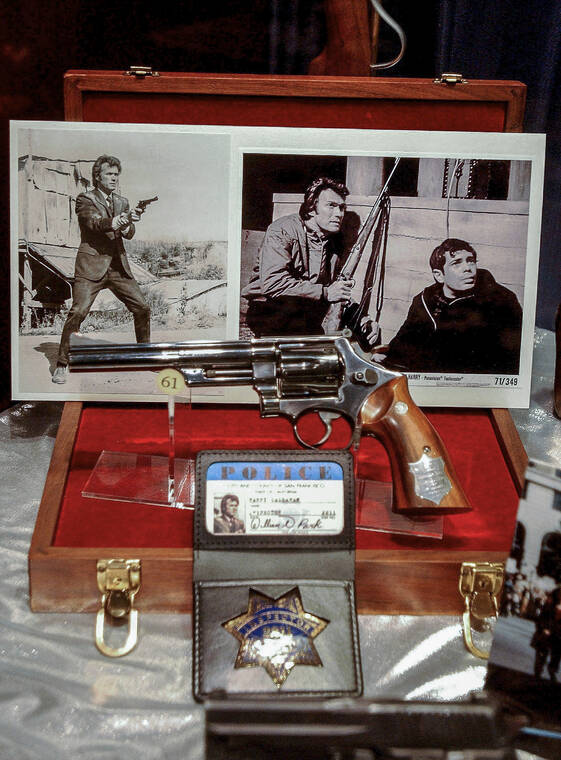 ASSOCIATED PRESS / 2002
                                Items from the National Firearms Museum exhibit of guns and memorabilia used in movies, such as Clint Eastwood’s gun and badge from “Dirty Harry,” are shown at the NRA Headquarters in Fairfax, Va. Guns used in making movies are sometimes real weapons that can fire either bullets or blanks, which are gunpowder charges that produce a flash and a bang but no deadly projectile. Even blanks can eject hot gases and paper or plastic wadding from the barrel that can be lethal at close range.