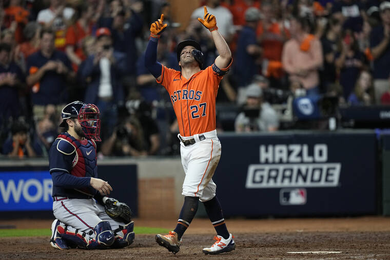 ASSOCIATED PRESS / OCT. 27
                                Houston Astros’ Jose Altuve celebrates after a home run during the seventh inning in Game 2 of baseball’s World Series between the Houston Astros and the Atlanta Braves in Houston.