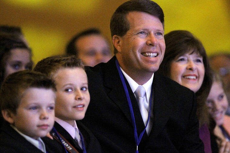 ASSOCIATED PRESS
                                Jim Bob Duggar and his family listen as former Arkansas Gov. Mike Huckabee speaks to the Values Voter Summit, held by the Family Research Council Action, on Sept. 17, 2010, in Washington. On Friday, Duggar, whose large family was featured in the TLC reality show “19 Kids and Counting,” has announced he’s running for a seat in the Arkansas Senate.