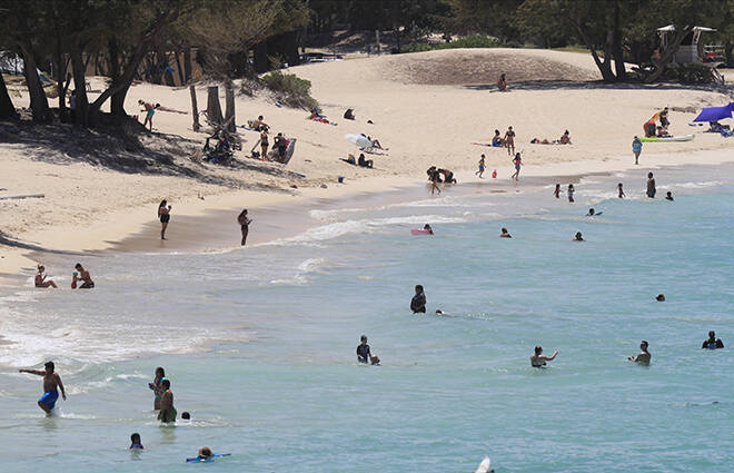 JAMM AQUINO / 2020
                                Beachgoers enjoy the ocean at Kailua Beach Park on June 29, 2020 in Kailua.