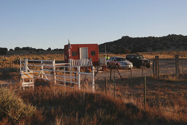 ASSOCIATED PRESS
                                The entrance to a film set where police say actor Alec Baldwin fired a prop gun, killing a cinematographer, is seen outside Santa Fe, New Mexico. The Bonanza Creek Ranch film set has permanent structures for background used in Westerns, including “Rust,” the film Baldwin was working on when the prop gun discharged.