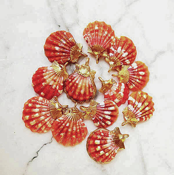 COURTESY MADE IN HAWAII FESTIVAL
                                Festival Sunrise shell necklaces from Flotsam & Co. feature 24kt. gold plating