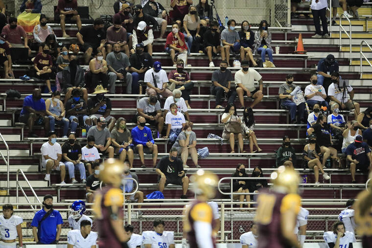 JAMM AQUINO / JAQUINO@STARADVERTISER.COM
                                Fans are seen in the stands during Saturday’s game.