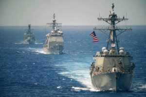 US NAVY / OCT. 3
                                The Hawaii-based guided missile destroyer USS Chafee, right, sails in formation with the guided-missile cruiser USS Lake Champlain and Royal Canadian Navy frigate HMCS Winnipeg in the Philippine Sea as part of a flotilla that included four aircraft carriers.