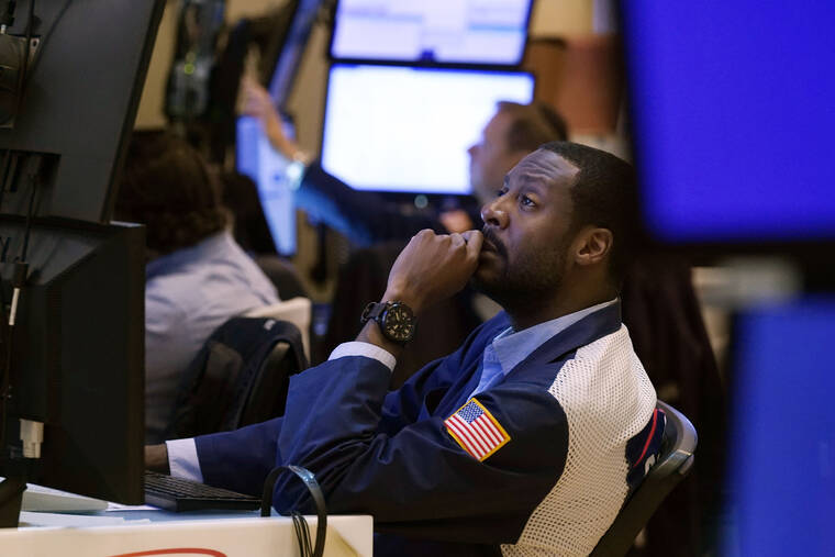 ASSOCIATED PRESS
                                Trader Aaron Ford worked on the floor of the New York Stock Exchange, today. Wall Street added to its recent run of milestones today as stock indexes hit new highs again and the Dow Jones Industrial Average closed above 36,000 points for the first time.