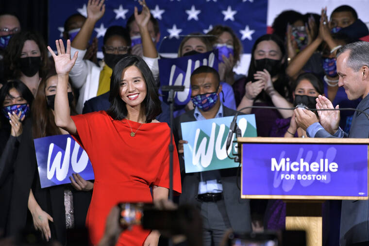 ASSOCIATED PRESS
                                Boston Mayor-elect Michelle Wu greets supporters at her election night party in Boston. Wu defeated fellow City Councilor Annissa Essaibi George in the race.
