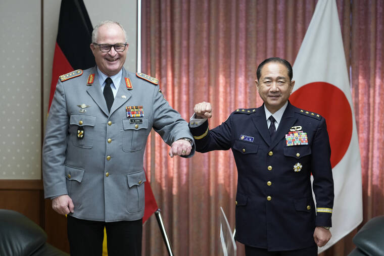 ASSOCIATED PRESS
                                Gen. Eberhard Zorn, chief of Defense of the German Armed Forces, left, and Gen. Koji Yamazaki, chief of Staff, Joint Staff of the Japan Self-Defense Forces, posed for a photo before their talk at the Ministry of Defense in Tokyo, Friday.