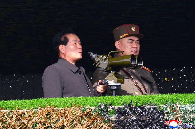ASSOCIATED PRESS
                                This photo provided by the North Korean government shows North Korean senior official Pak Jong Chon, left, inspects the army’s artillery firing competition on Saturday in undisclosed location in North Korea. Independent journalists were not given access to cover the event depicted in this image distributed by the North Korean government. The content of this image is as provided and cannot be independently verified. Korean language watermark on image as provided by source reads: “KCNA” which is the abbreviation for Korean Central News Agency.