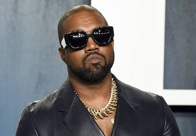 EVAN AGOSTINI/INVISION/ASSOCIATED PRESS
                                Kanye West arrived at the Vanity Fair Oscar Party, in February 2020, in Beverly Hills, Calif. Rapper and fashion mogul Ye’s high-end clothing company Yeezy has agreed to pay $950,000 to settle a lawsuit over slow shipping to customers.