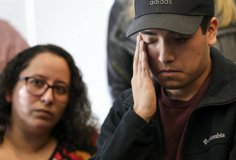 JON SHAPLEY/HOUSTON CHRONICLE VIA AP / NOV. 8
                                Joel Acosta fights back emotion as he listens during a press conference about his brother Axel Acosta Avila’s death at the law office of Tony Buzbee in Houston. The family and Buzbee announced a lawsuit in response to the 21-year-old’s death at the Astroworld music festival.