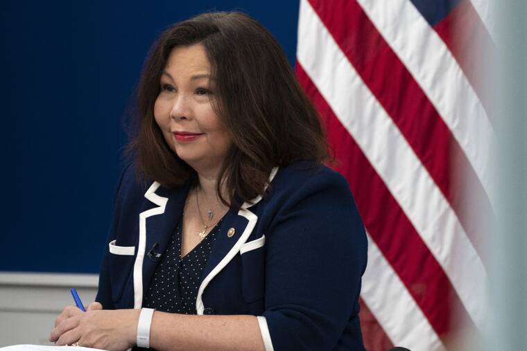 ASSOCIATED PRESS
                                Sen. Tammy Duckworth, D-Ill., attends a discussion of care policies with Vice President Kamala Harris on Oct. 14 in the South Court Auditorium on the White House complex in Washington.