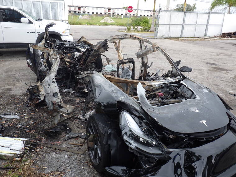 NTSB VIA ASSOCIATED PRESS
                                Damage to a 2021 Tesla Model 3 Long Range Dual Motor electric car was seen following a crash, in September, in Coral Gables, Fla. The Tesla driver who died with a passenger in a fiery September crash near Miami accelerated to 90 mph in the seconds before he lost control and smashed into trees, federal investigators said today — a conclusion disputed by the attorney representing the driver’s family.