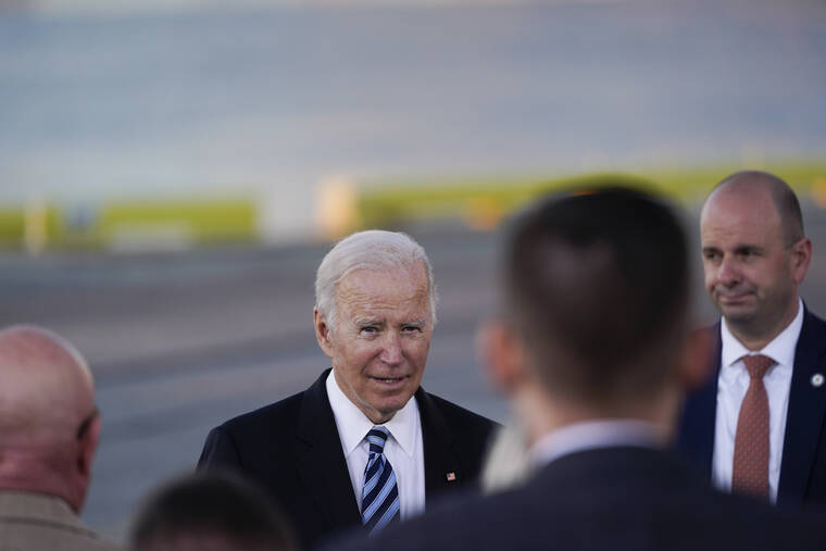 ASSOCIATED PRESS
                                President Joe Biden greets people after speaking during a visit at the Port of Baltimore.