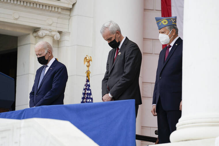 ASSOCIATED PRESS
                                President Joe Biden stood next to Veterans Affairs Secretary Denis McDonough during an event to commemorate Veterans Day at Arlington National Cemetery, today, in Arlington, Va.