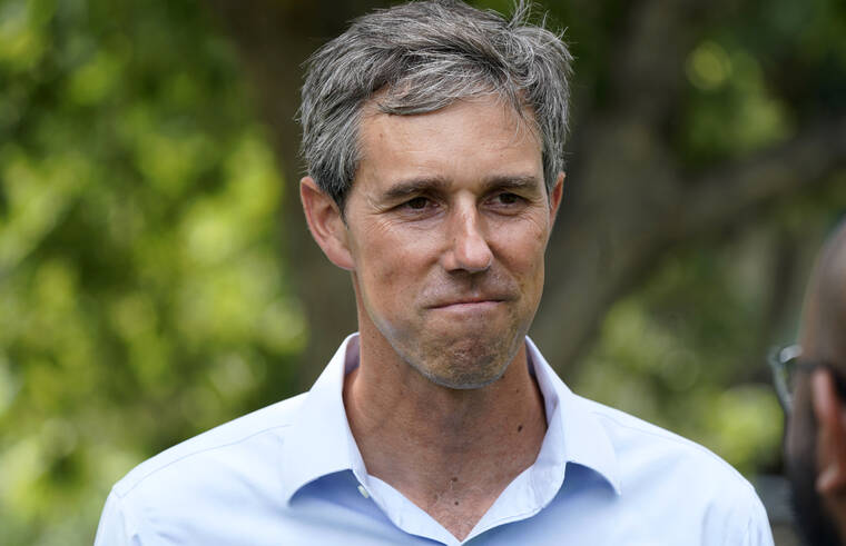 ASSOCIATED PRESS
                                Democrat Beto O’Rourke listened to a volunteer before a Texas Organizing Project neighborhood walk in West Dallas on June 9. O’Rourke is running for governor of Texas.