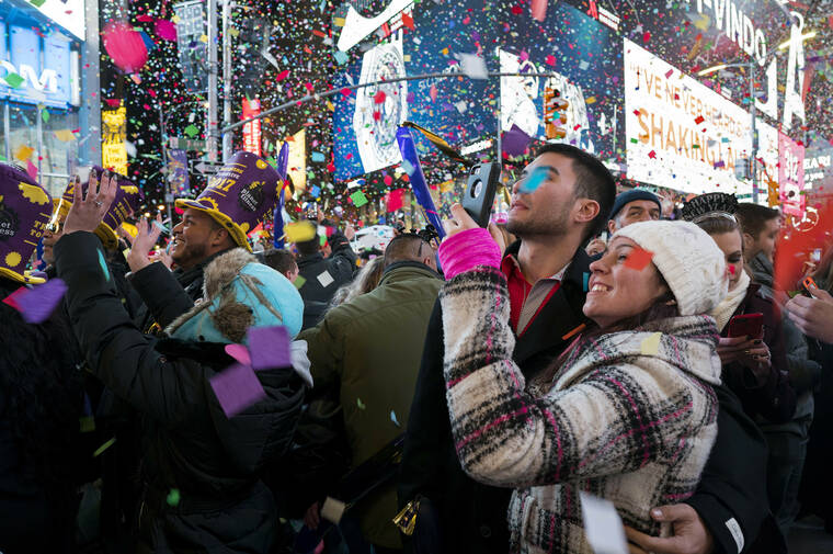 ASSOCIATED PRESS
                                Confetti fell as people celebrated the new year in New York’s Times Square, Jan. 1, 2017. Crowds will once again fill New York’s Times Square this New Year’s Eve, with proof of COVID-19 vaccination required for revelers who want to watch the ball drop in person, Mayor Bill de Blasio announced today.