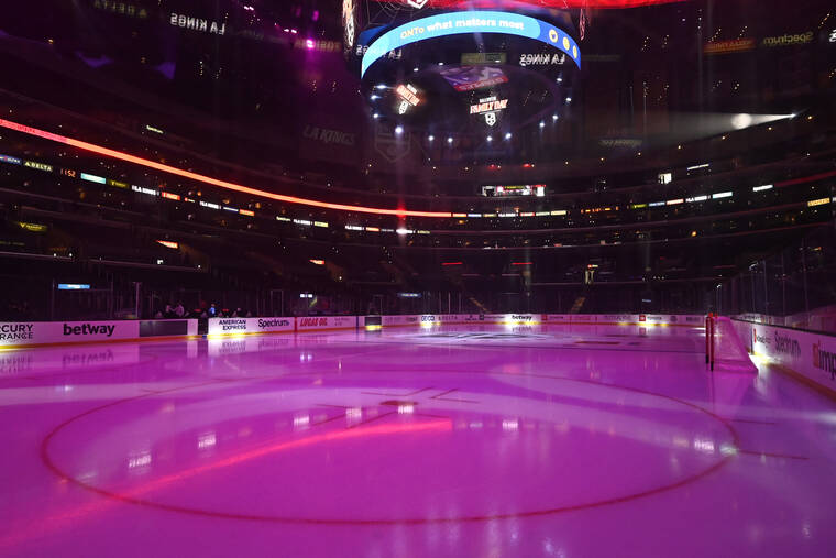ASSOCIATED PRESS
                                The ice at Staples Center was illuminated before an NHL hockey game between the Los Angeles Kings and the Buffalo Sabres, Oct. 31, in Los Angeles.