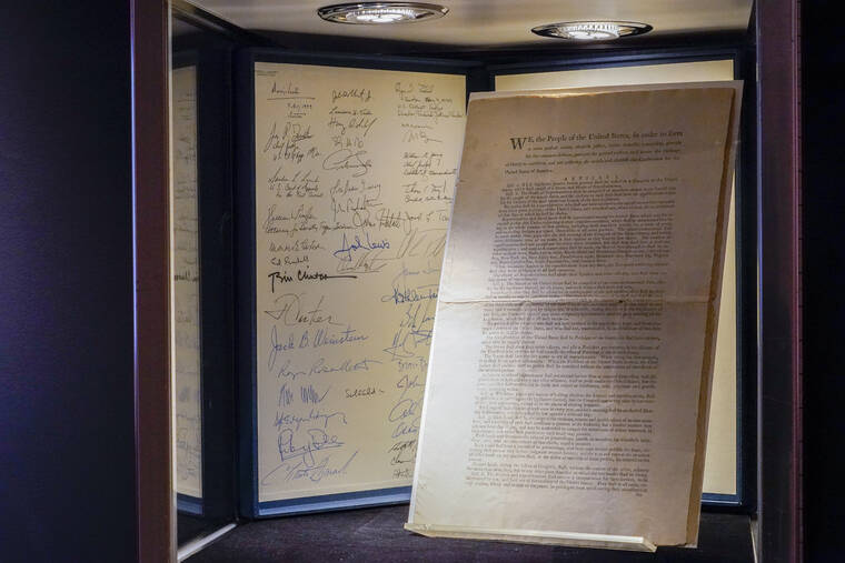 ASSOCIATED PRESS
                                A first printing of the United States Constitution is displayed at Sotheby’s auction house during a press preview on Nov. 5 in New York. The rare copy has sold Thursday, for a record $43.2 million at Sotheby’s to an anonymous buyer who outbid a group of crypocurrency investors.