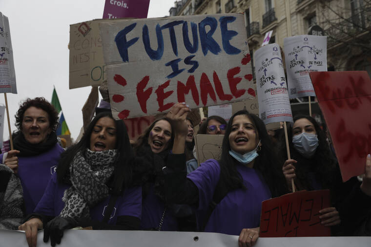 ASSOCIATED PRESS
                                Women demonstrate against violence against women in Paris. Tens of thousands of protesters marched Saturday through Paris and other French cities to demand more government action to prevent violence against women. The demonstrations come amid growing outrage in France over women killed by their partners and as French women are increasingly speaking out about sexual harassment and abuse.