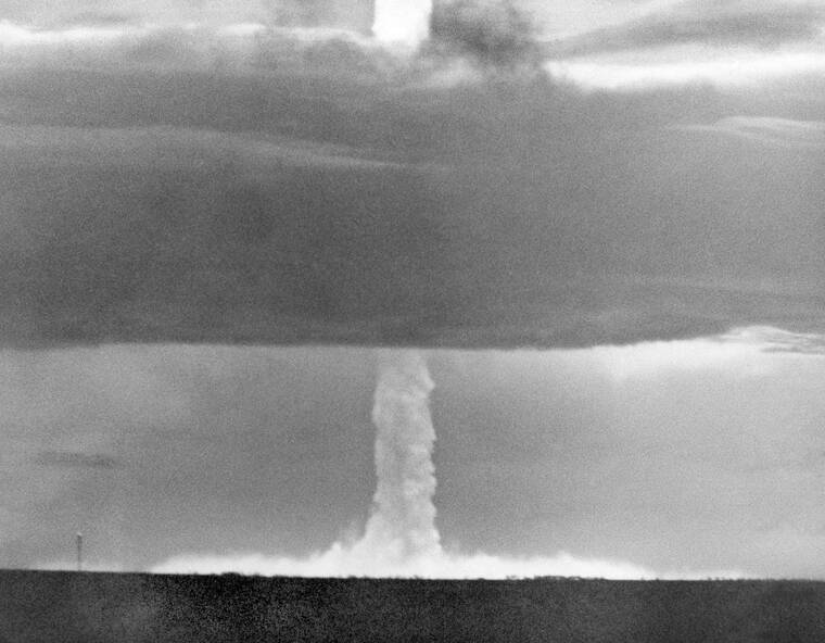 ASSOCIATED PRESS
                                The stem of a hydrogen bomb, the first such nuclear device dropped from a U.S. aircraft, moved upward through a heavy cloud and comes through the top of the cloud, after the bomb was detonated over Namu Island in the Bikini Atoll, Marshall Islands on May 21, 1956.