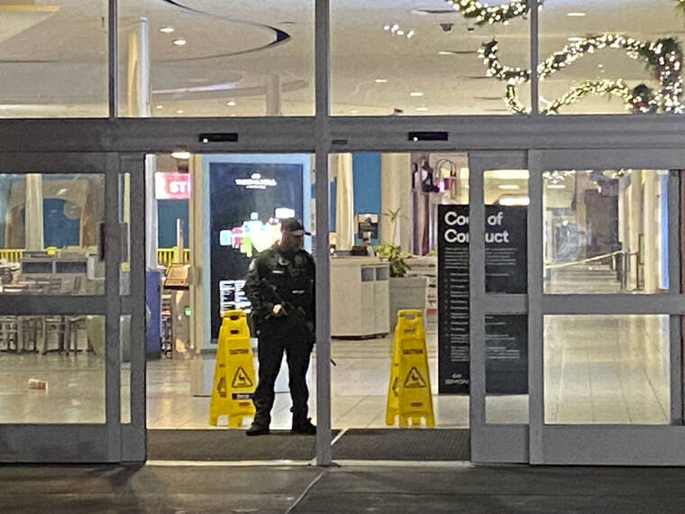 CRAIG SAILOR/THE NEWS TRIBUNE VIA AP / NOV. 26
                                An officer guards an entrance to the Tacoma Mall in Tacoma, Wash. Gunshots rang out in the shopping center earlier in the evening with one person being shot.
