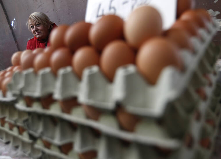 ASSOCIATED PRESS
                                Vendor Judit Sos sold eggs in a food market in Budapest, Hungary, Nov. 20. From appliance stores in the United States to food markets in Hungary and gas stations in Poland, rising consumer prices fueled by high energy costs and supply chain disruptions are putting a pinch on households and businesses worldwide.