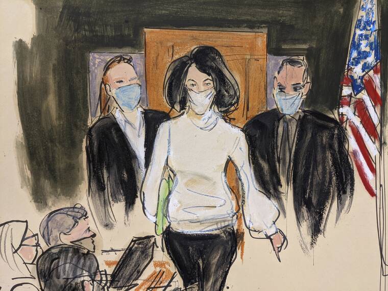 ASSOCIATED PRESS
                                In this courtroom sketch, Ghislaine Maxwell enters the courtroom escorted by U.S. Marshalls at the start of her trial today in New York. Two years after Jeffrey Epstein’s suicide behind bars, a jury is set to be picked in New York City to determine a central question in the long-running sex trafficking case: Was his longtime companion, Ghislaine Maxwell, Epstein’s puppet or accomplice?