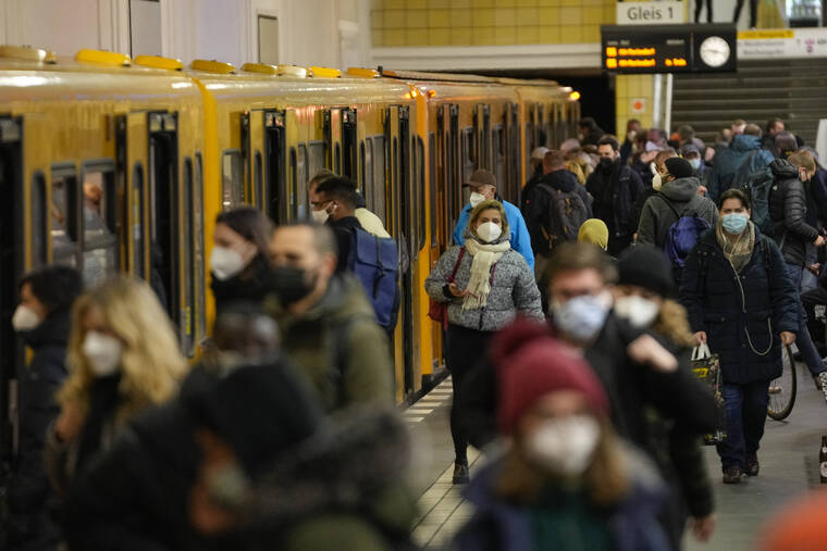ASSOCIATED PRESS
                                People wore face masks to protect against the coronavirus at the public transport station Friedrichstrasse in Berlin, Germany, today. New findings about the coronavirus’s omicron variant made it clear today that the emerging threat slipped into countries before their defenses were up.
