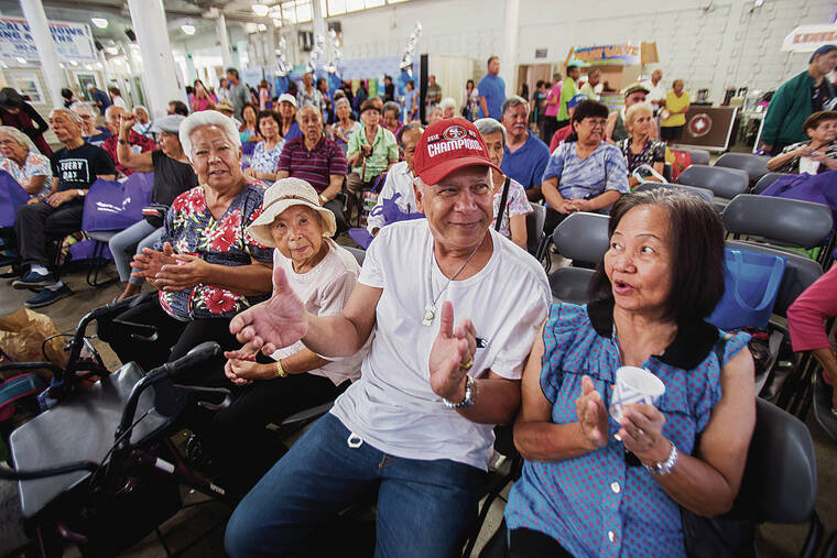 STAR-ADVERTISER / SEPT. 20, 2019
                                The second Young at Heart Expo will be held Friday and Saturdayat the Hawaii Convention Center, from 9 a.m. to 5 p.m. Shown here, attendees enjoy music being played at the first Young at Heart Expo, which was held in September 2019, months before the pandemic reached Hawaii. This year’s expo requires all attendees to wear masks, as well as show either proof of vaccination or a negative COVID-19 test result within 48 hours of entry.