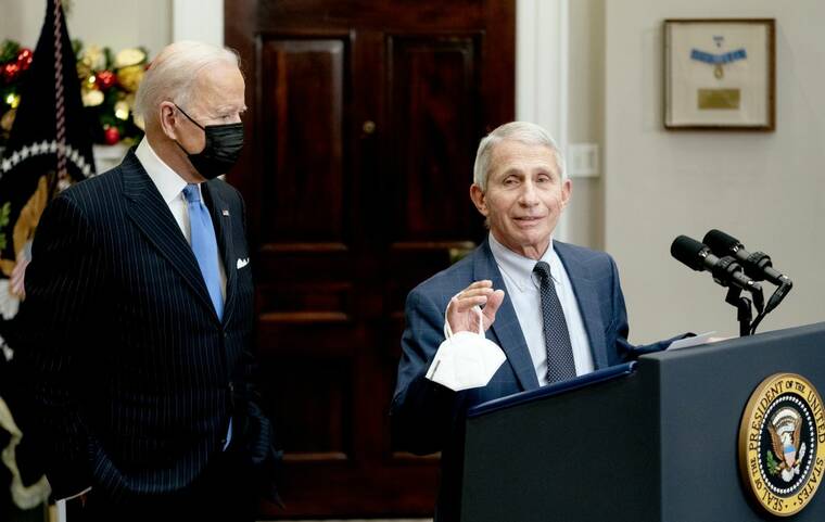 STEFANI REYNOLDS/THE NEW YORK TIMES
                                Dr. Anthony Fauci, director of the National Institute of Allergy and Infectious Diseases, spoke about the new omicron variant of the coronavirus, at the White House in Washington, today, as President Joe Biden looked on. His remarks come as federal health officials urged vaccinations and as countries around the world institute travel restrictions to curb the variant’s spread.