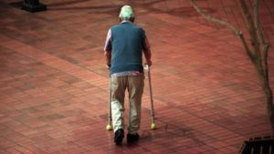 STAR-ADVERITSER
                                Elderly man walking at Windward Mall, Hawaii.