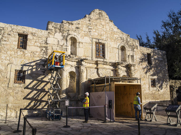 MATTHEW BUSCH/THE NEW YORK TIMES / NOV. 19
                                The Alamo Church, part of the Alamo grounds, undergoing renovation in San Antonio. Native Americans built the Alamo and hundreds of converts were buried there — descendants are now fuming because Texas has rejected efforts to protect the site.