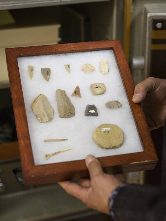 MATTHEW BUSCH/THE NEW YORK TIMES / NOV. 18
                                Artifacts, including arrowheads and necklace ornaments, found with the remains of Native Americans buried at a Texas mission in the mid- to late 1700s, in San Antonio,. Native Americans built the Alamo and hundreds of converts were buried there — descendants are now fuming because Texas has rejected efforts to protect the site.