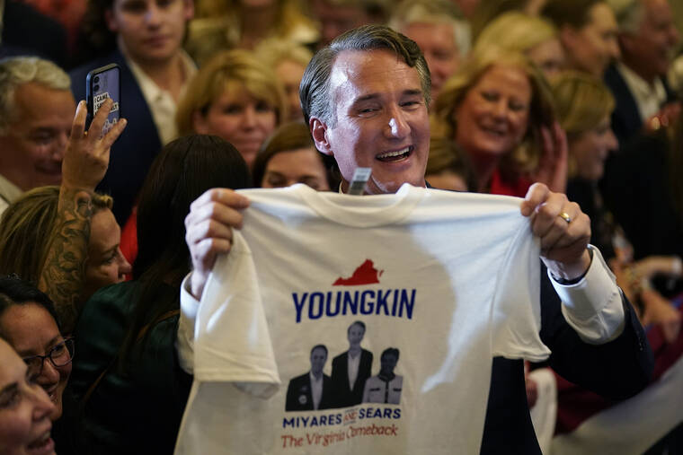 ASSOCIATED PRESS
                                Virginia Gov.-elect Glenn Youngkin greets supporters at an election night party in Chantilly, Va., early Wednesday.
