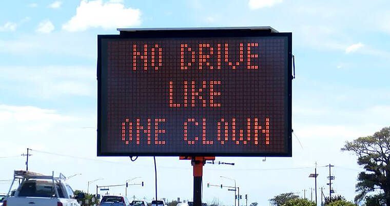 HAWAII NEWS NOW VIA AP
                                In this image taken from video, a road sign is posted along a Maui roadway in an attempt to slow speeding traffic.